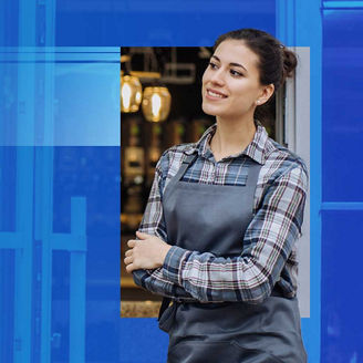 Shopkeeper looking out into street