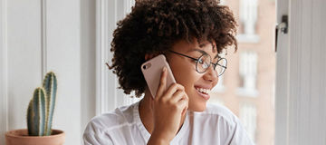 Woman on phone in office