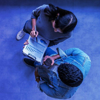 Two people chatting, seen from above