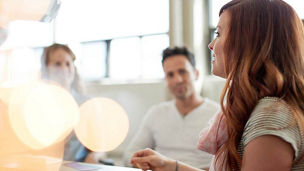 Woman speaking in meeting