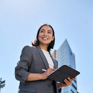 Woman using tablet outdoors 