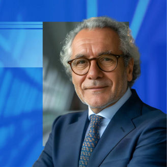 CEO gazing into camera in office building