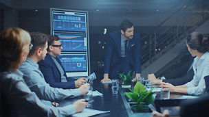 Woman pointing at screen