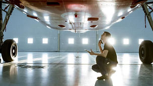 Engineer working on plane