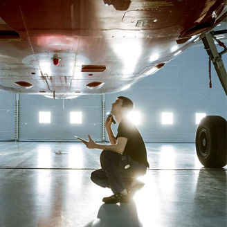 Engineer working on plane
