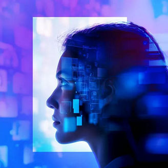 Woman looking at multiple projected screens