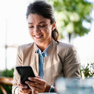 Executive working outdoors representing technology media and telecoms client success stories