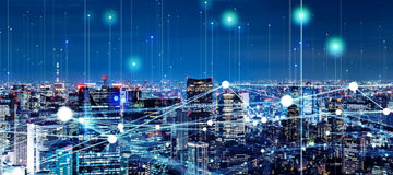 City at night with network map overlaid