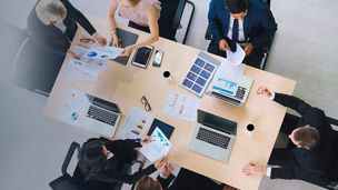 Group of people in meeting seen from above