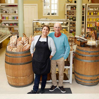 2 shopowners in shop representing business tax