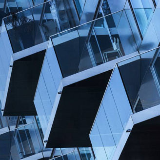 Glass balconies on tall building
