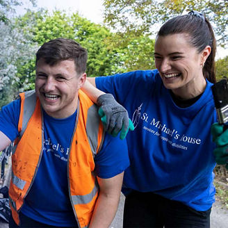 Volunteers painting at St. Michael's House
