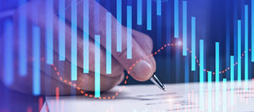 Person reading document with graphs overlaid