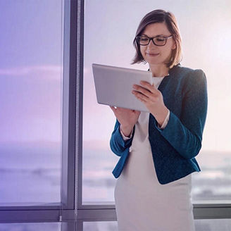 Woman using tablet in office
