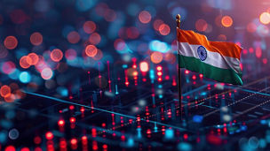 Small Indian flag on a pole placed on a surface with glowing red and blue lights, with a blurred background of colorful circular light patterns