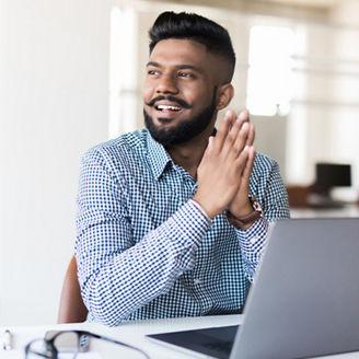 indian-man-working-on-laptop