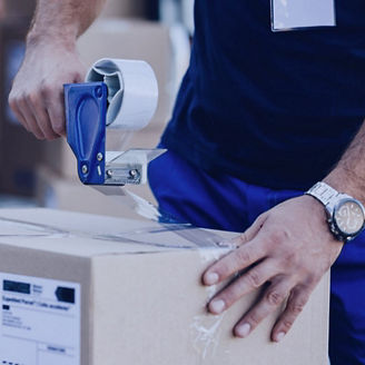 Person packaging an item.