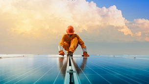 A man working at solar power station