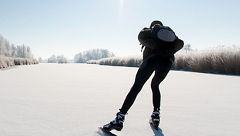 Skier skating in snow