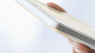 Man typing on a tablet