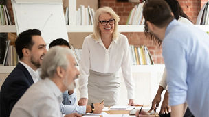 woman smiling team meeting