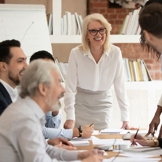 woman smiling team meeting