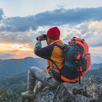 man looking with binocular