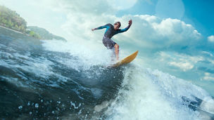 man surfing wave ocean