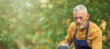 man watering