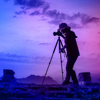 Silhouette Woman Photographing Against Sky During Sunset