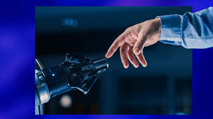 Japanese alt text: ロボットアームとの握手