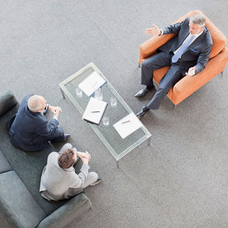 Businessmen meeting in lobby