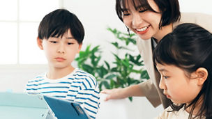 Children using a tablet to learn from a teacher.; Shutterstock ID 2289097535; purchase_order: MKTG-OM; job: ; client: ; other: 