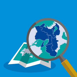 世界地図と虫眼鏡