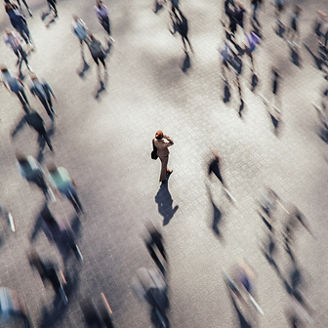 Businesswoman talking on the phone in the crowds of people. 3D generated image.