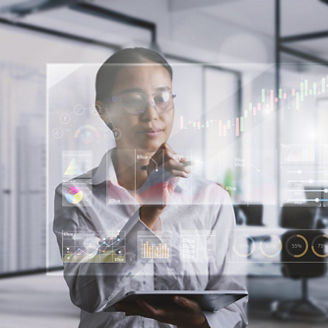 Asian business woman They are using innovative technology to grow their business with virtual reality screens.