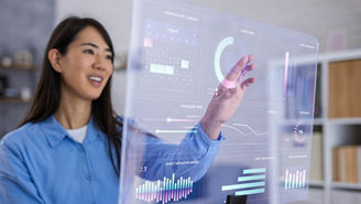Woman Using Futuristic Transparent Monitor to Control Smart Home System