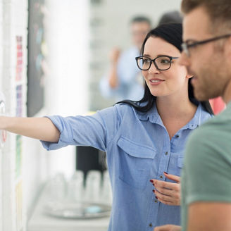 Cape Town, South Africa, colleagues conversing about charts