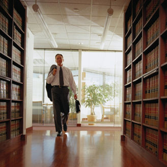 Lawyer Entering a Law Library