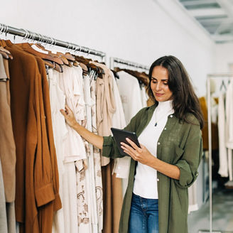 woman looking at clothes