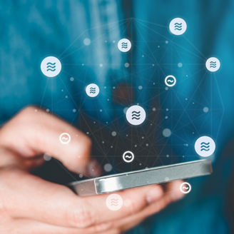 Libra Cryptocurrency Online banking businessman using smartphone with credit card Fintech and Blockchain concept