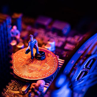 Bitcoin Cryptocurrency coin on a PC computer motherboard, crypto currency mining concept.