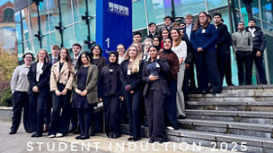Students standing on steps infront of the KPMG Leeds office