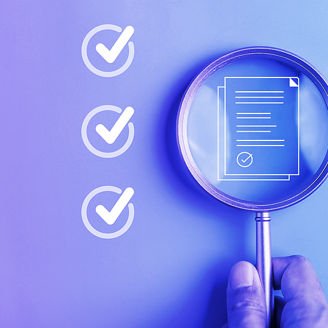 Magnifying glass placed on a document icon