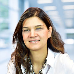 Blurred abstract background interior view looking out toward to empty office lobby and entrance doors and glass curtain wall with frame