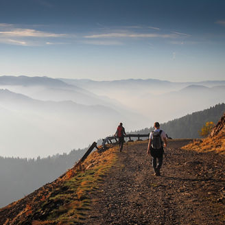man and woman hiking