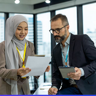 man-and-woman-looking-at-a-sheet-of-paper