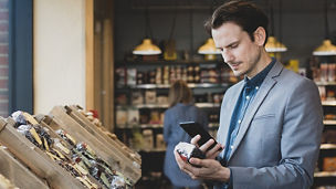 Man clicking picture of an object