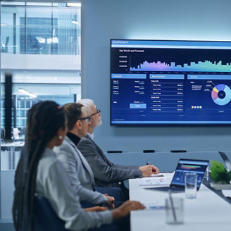 Man giving presentation on TV in a meeting