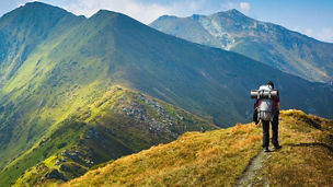 Man hiking on mountains